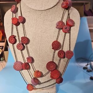 Chic Swirl Necklace with Red and Purple Accents
